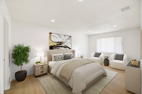 A bedroom with a large bed, a potted plant, and a painting on the wall.