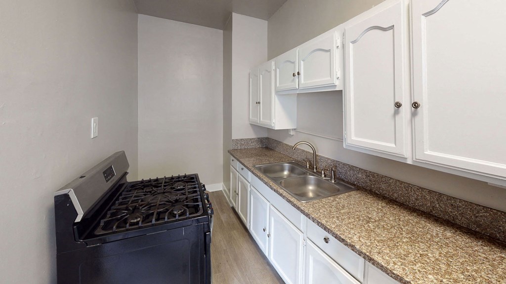 Kitchen Bar With Granite Counter Top at Hobart Apartments, Los Angeles, CA