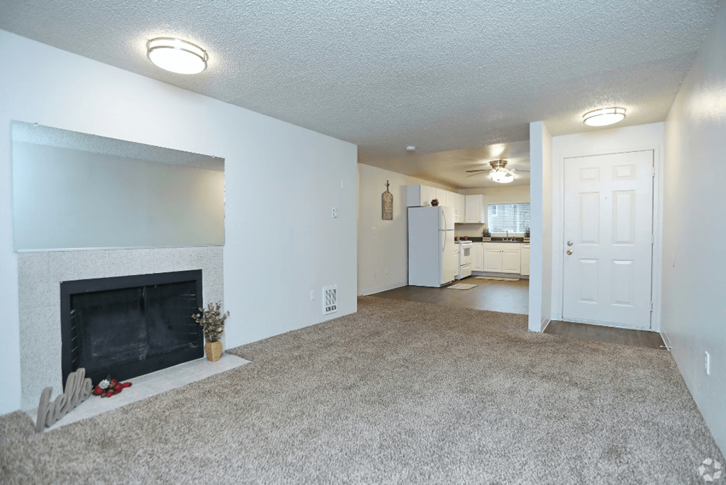 Living area with fireplace at Sunset Park Apartments, Washington , 98146