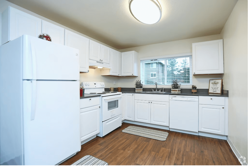 Efficient Appliances In Kitchen at Sunset Park Apartments, Seattle, Washington