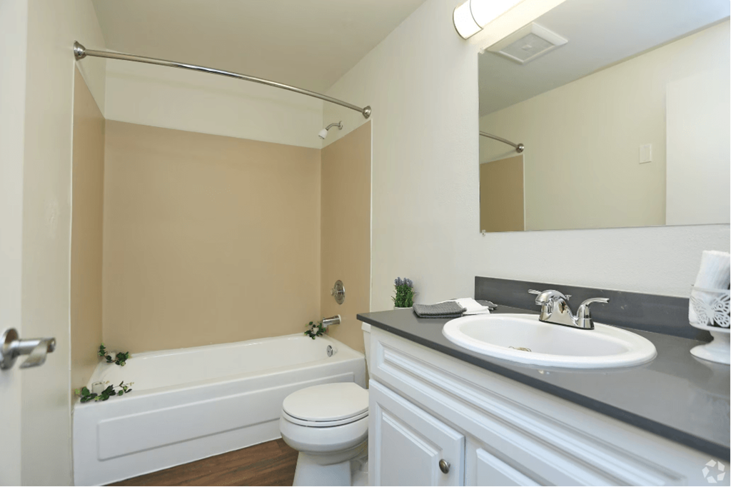 Bathroom With Extra Storage Space at Sunset Park Apartments, Seattle, WA, Washington