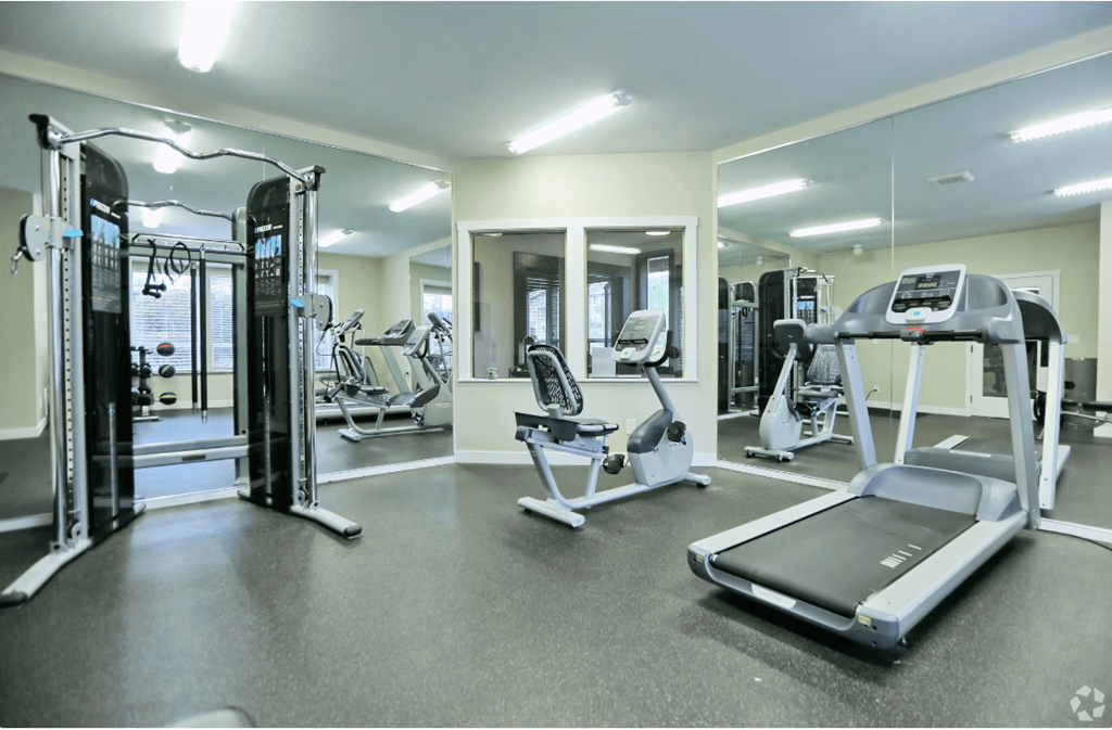 Fitness center with cardio equipment at Sunset Park Apartments, Seattle, WA, Washington