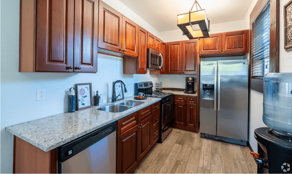 Kitchen with wooden closet at Sunset Park Apartments, Seattle, WA, Washington