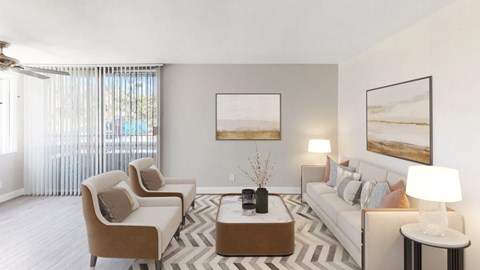 A living room with a white sofa, two chairs, and a coffee table.