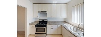 Kitchen at Sylvan Gardens Apartments in Van Nuys, CA