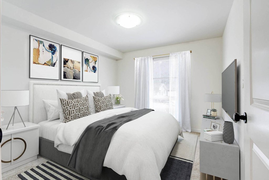 a bedroom with a bed and a window  at Delano, Redmond, WA 98052