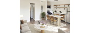 Modern living room with white sofa at Wilson Apartments, Glendale, CA