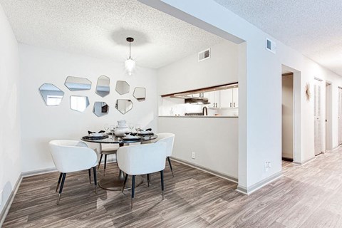 A dining room with a table set for four.at Laurel, Georgia  