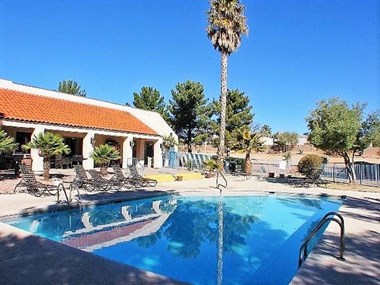 Large, newly resurfaced heated swimming pool, 3-6 feet deep with multiple lounge chairs