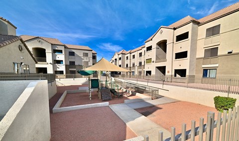 A sunny day at the courtyard of apartment buildings.