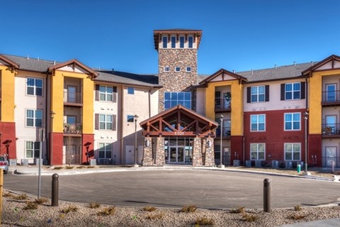A large building with a tower in the middle of it.
