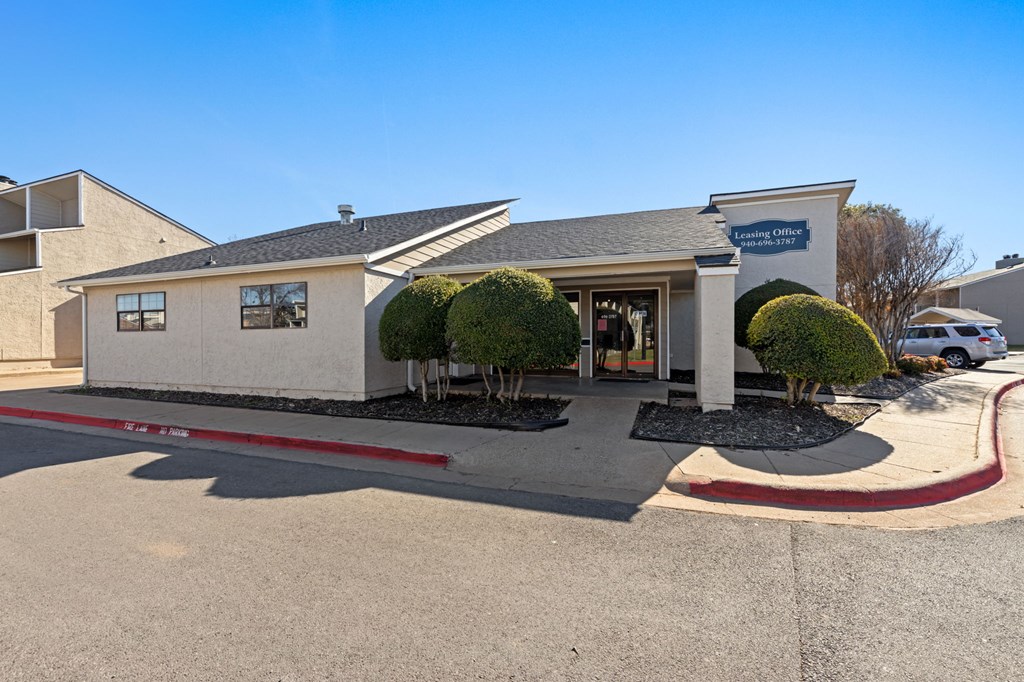 A building with a sign that reads "Covenant College" is shown.