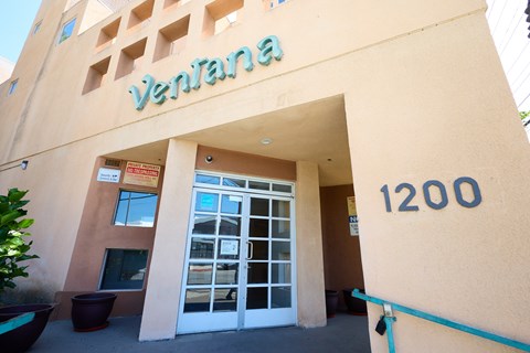 The entrance to a building with the name Ventana on it.