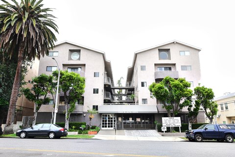 A building with a sign that says "Residential" in front of it.