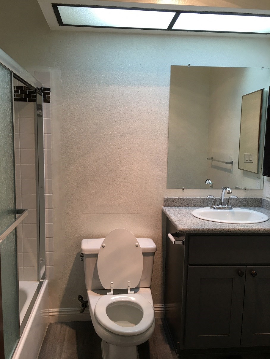 a small bathroom with a toilet and a sink