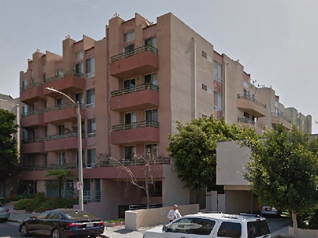 the apartment building is shown in a photo from google maps