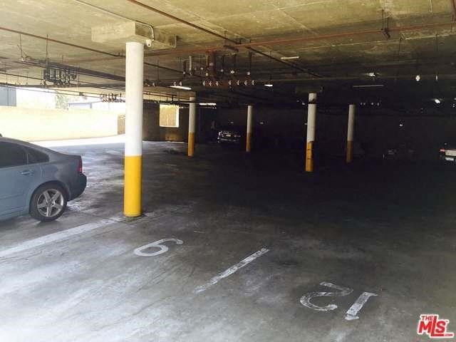 a car is parked in a parking garage