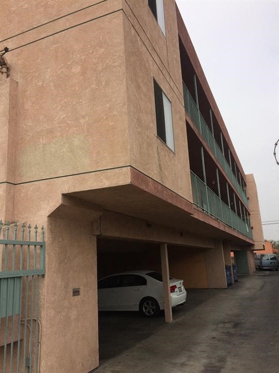 a building with a car parked under it