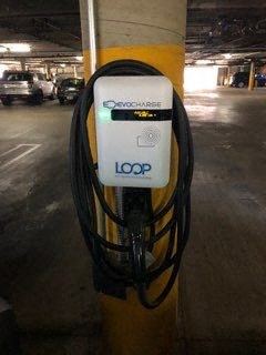 a parking meter with a bunch of wires on it