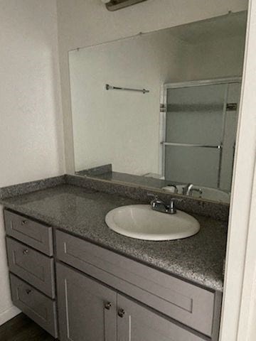 a bathroom with a sink and a mirror