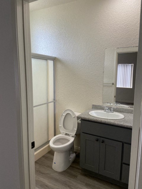 a bathroom with a toilet and a sink