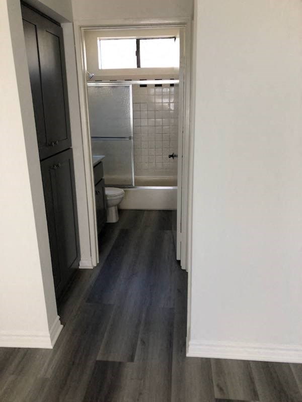a small bathroom with a toilet and a window
