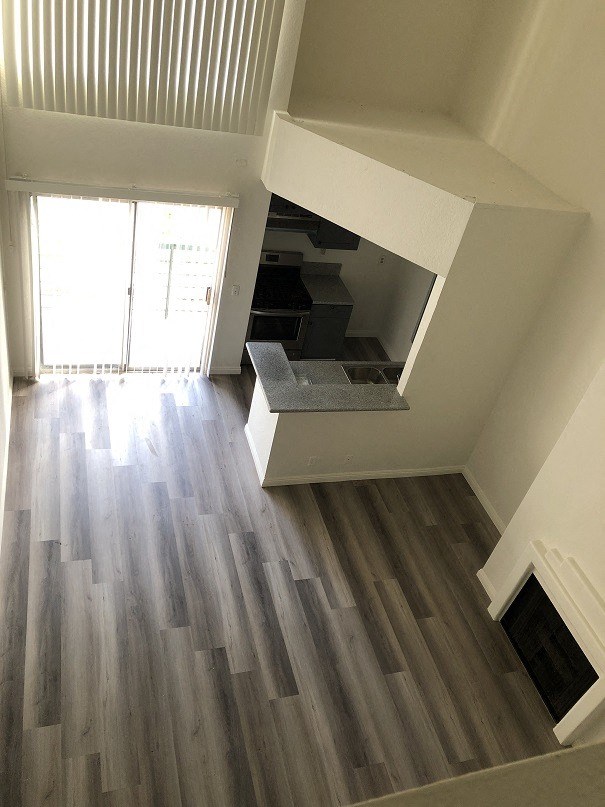 a view of the living room from the top of the stairs