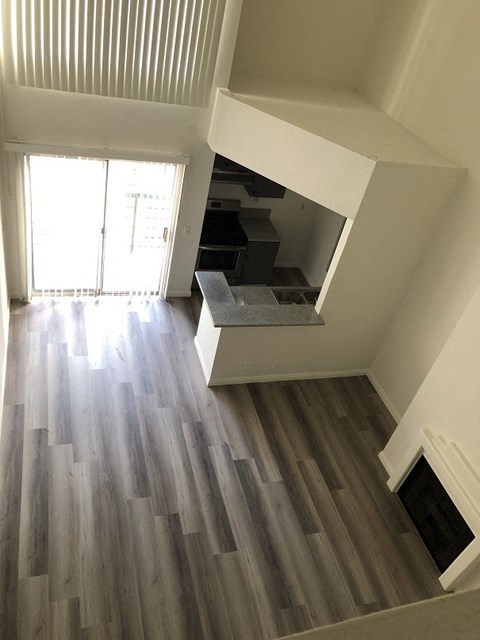 a view of the living room from the top of the stairs