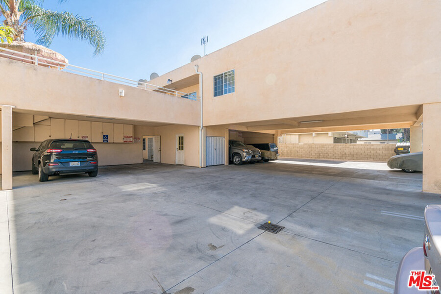 a parking garage with cars parked in it