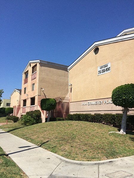 a brick building with a sign on the side of it