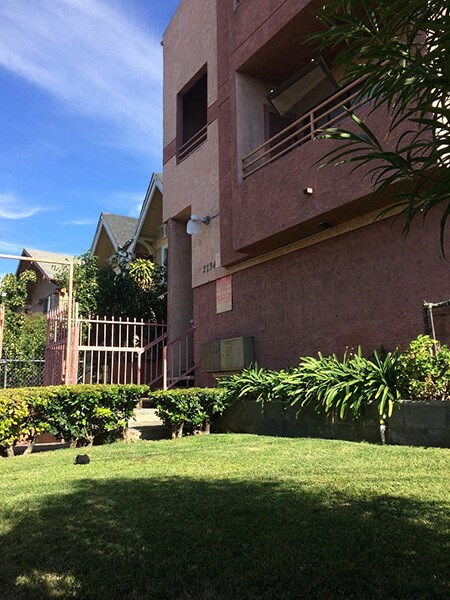 a house with a yard in front of it