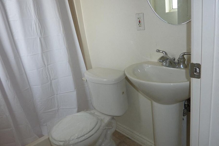 a small bathroom with a toilet and a sink