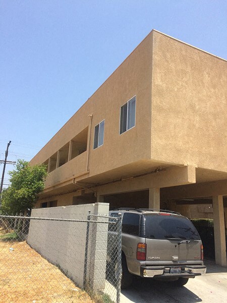 a van parked in front of a building