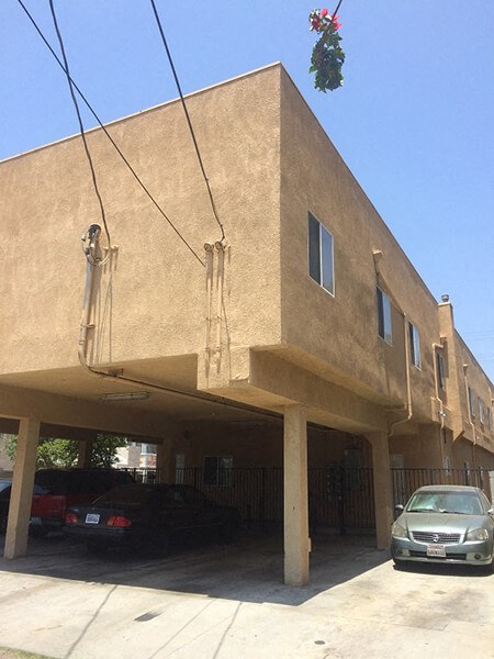 a building with a car parked in front of it