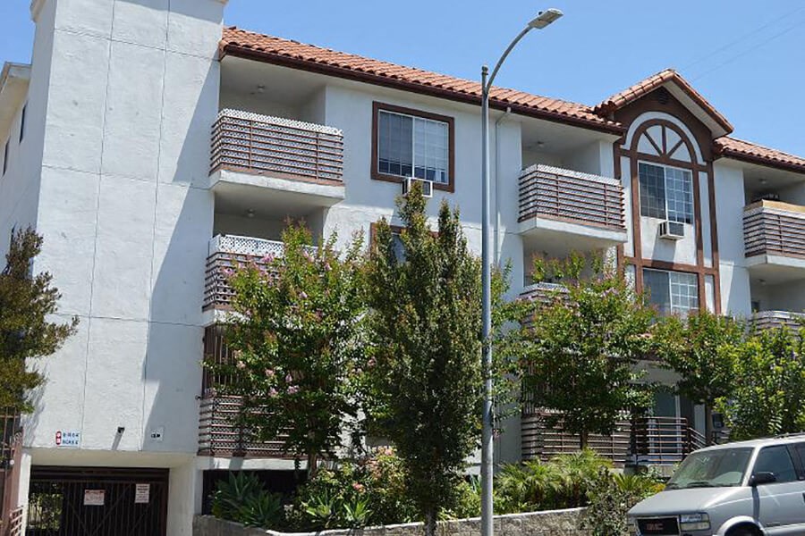 a building with a car parked in front of it