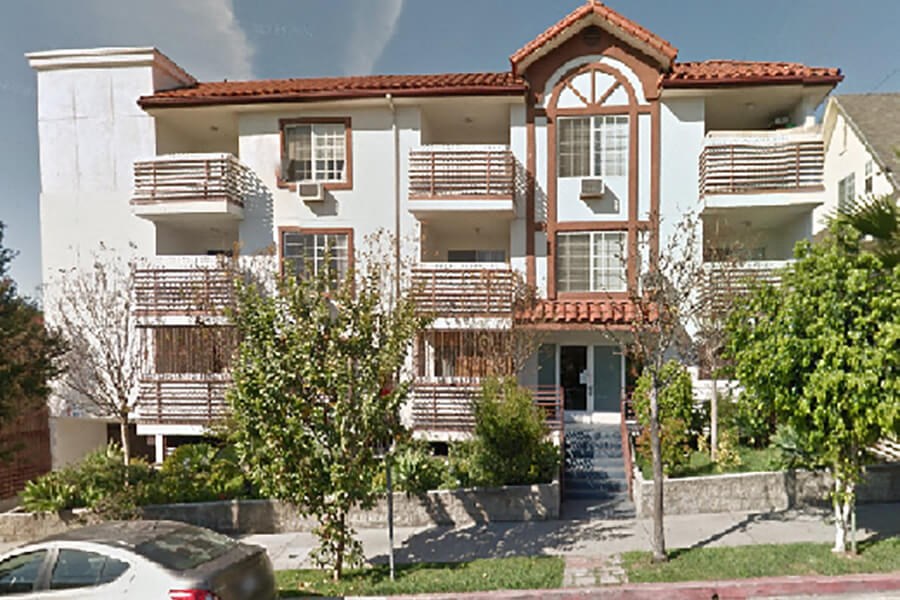 a house with a car parked in front of it