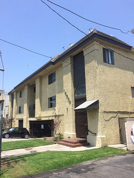 a building with a car parked outside of it