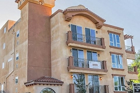 a building with two balconies on the side of it