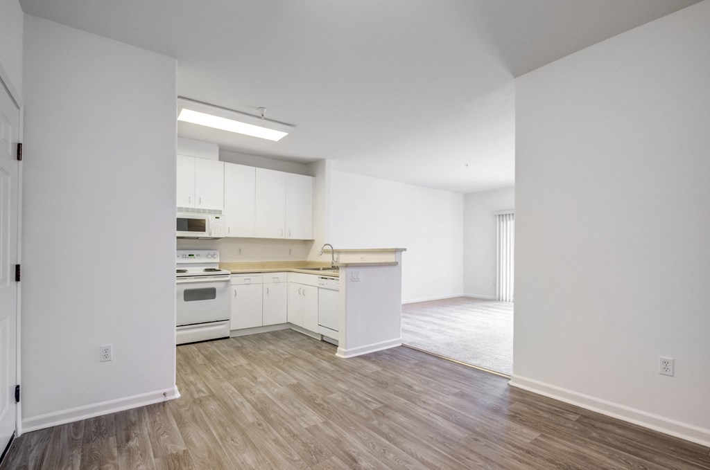 an empty kitchen and living room in a house  at Cornerstone at Gale Ranch, San Ramon, 94582