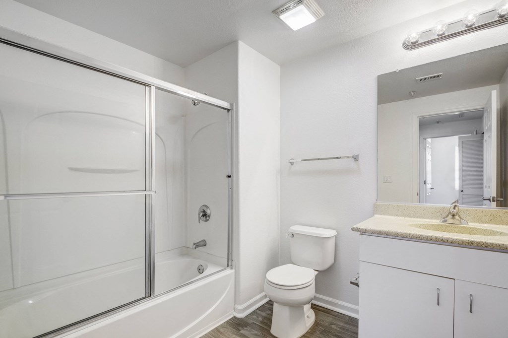 a bathroom with a toilet sink and shower  at Cornerstone at Gale Ranch, San Ramon, California