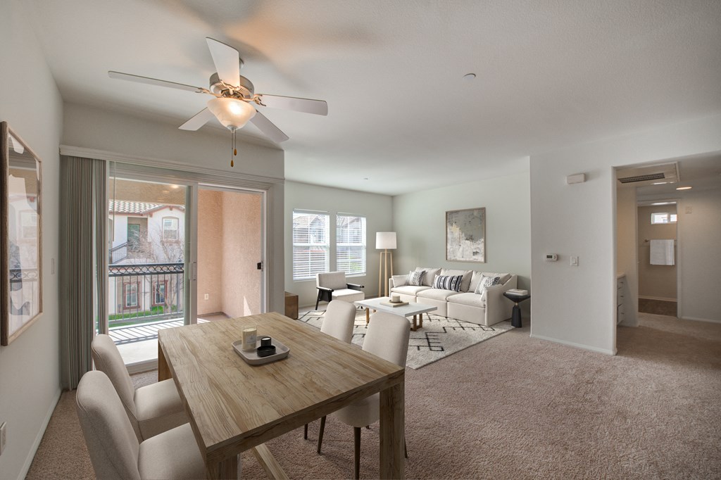 Living room with a ceiling fan and dining room at Monarch at Dos Vientos Newbury Park, CA 91320