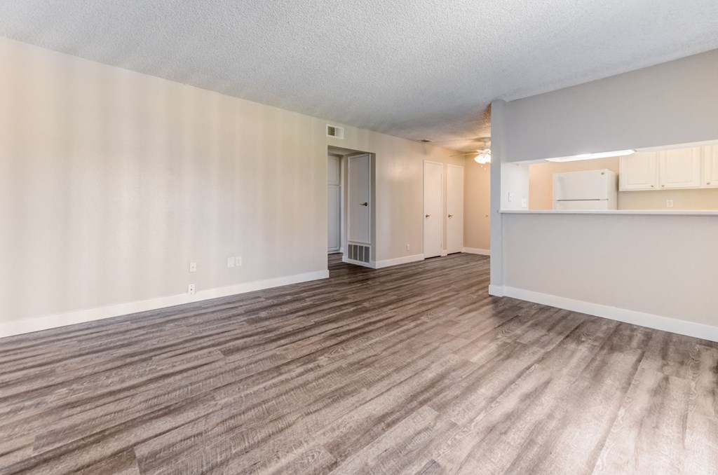 Spacious living room and dining room at Redlands Park Apts, Redlands, CA