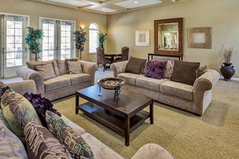 a living room with couches and a coffee table  at Falcon Bridge at Gale Ranch, San Ramon, CA