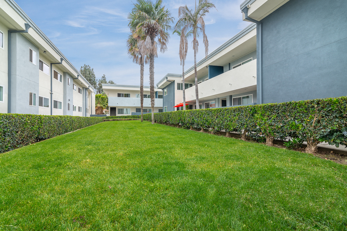 Lush Green Outdoor at Park Apartments, California, 90650