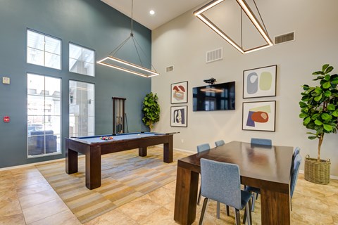 Community room with a pool table and a dining table at Sonoma at Porter Ranch, CA, 91326
