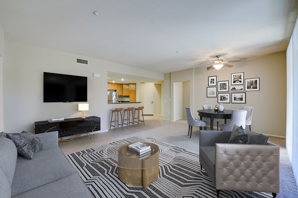 a living room with a couch and a chair  at Sonoma at Porter Ranch, Porter Ranch
