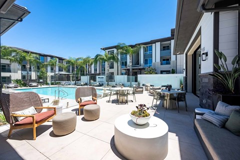A poolside patio area with chairs and a table The Overlook Santa Clarita, CA 91350