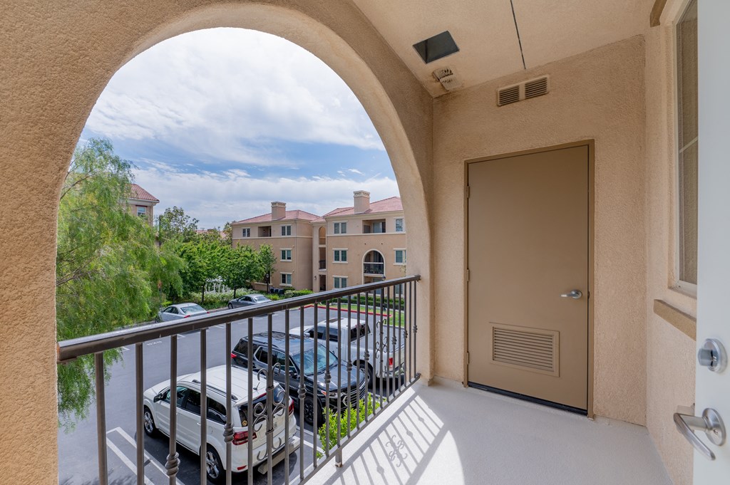 a balcony with a view of a parking lot  at Ventana Senior Apartments, Northridge, CA, 91326