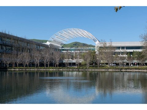a view of the stadium from across the lake