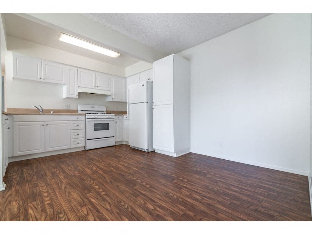 Wood Inspired Plank Flooring at Costa Mesa Family Village, California, 92627
